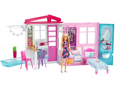 Ferienhaus mit Möbeln und Puppe